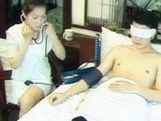 Japanese nurse comes to the rescue with her sensual touch and cures young patient's fever