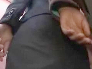 Asian Businesswoman's Wet and Wild Elevator Ride